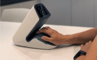  A person resting their hand on a medical device