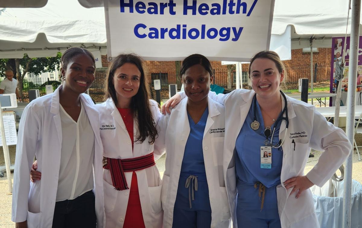 cardiology fellows at a community health fair