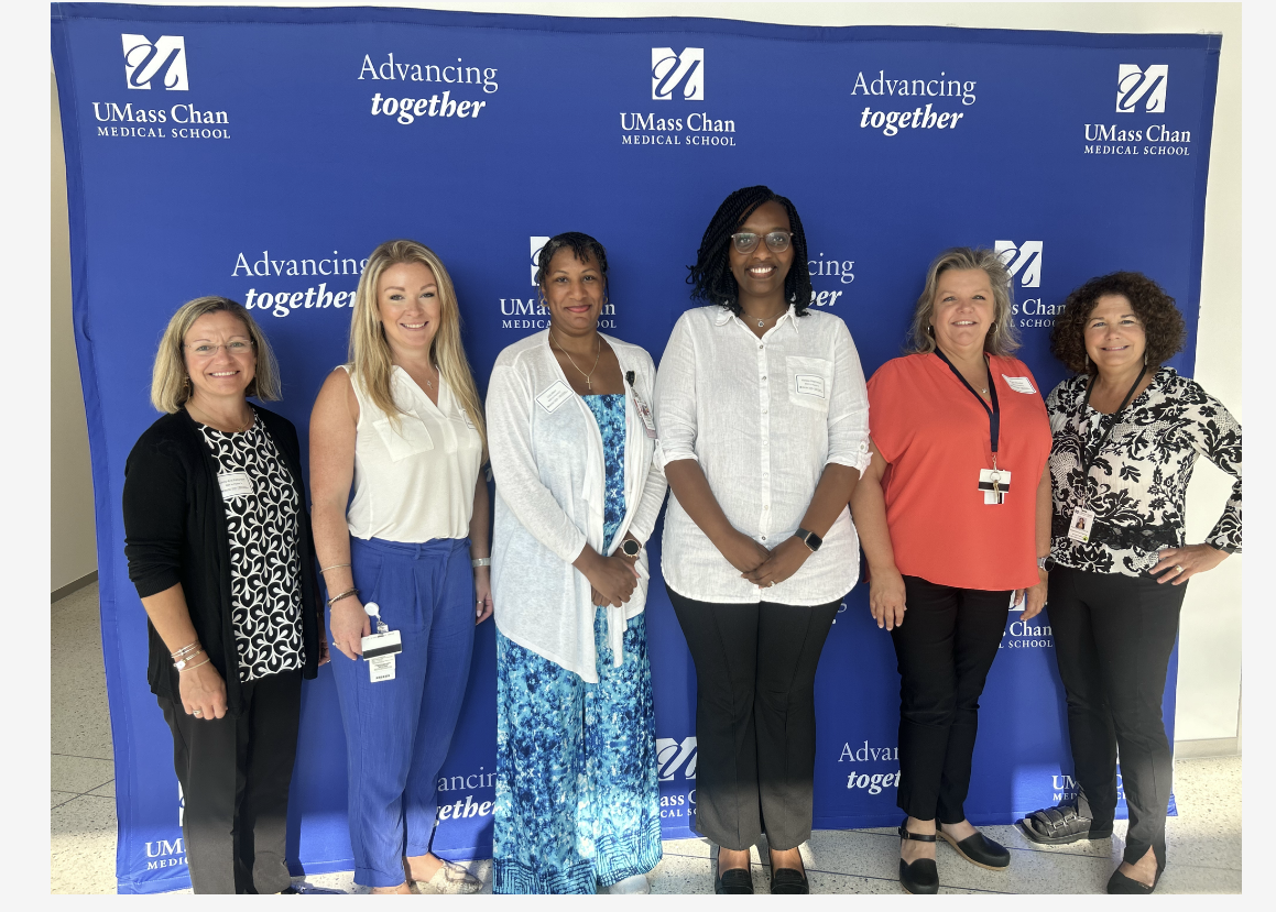 UMass Chan Medical School Masters interprofessional Nursing Students posing with program director Mary Antonelli