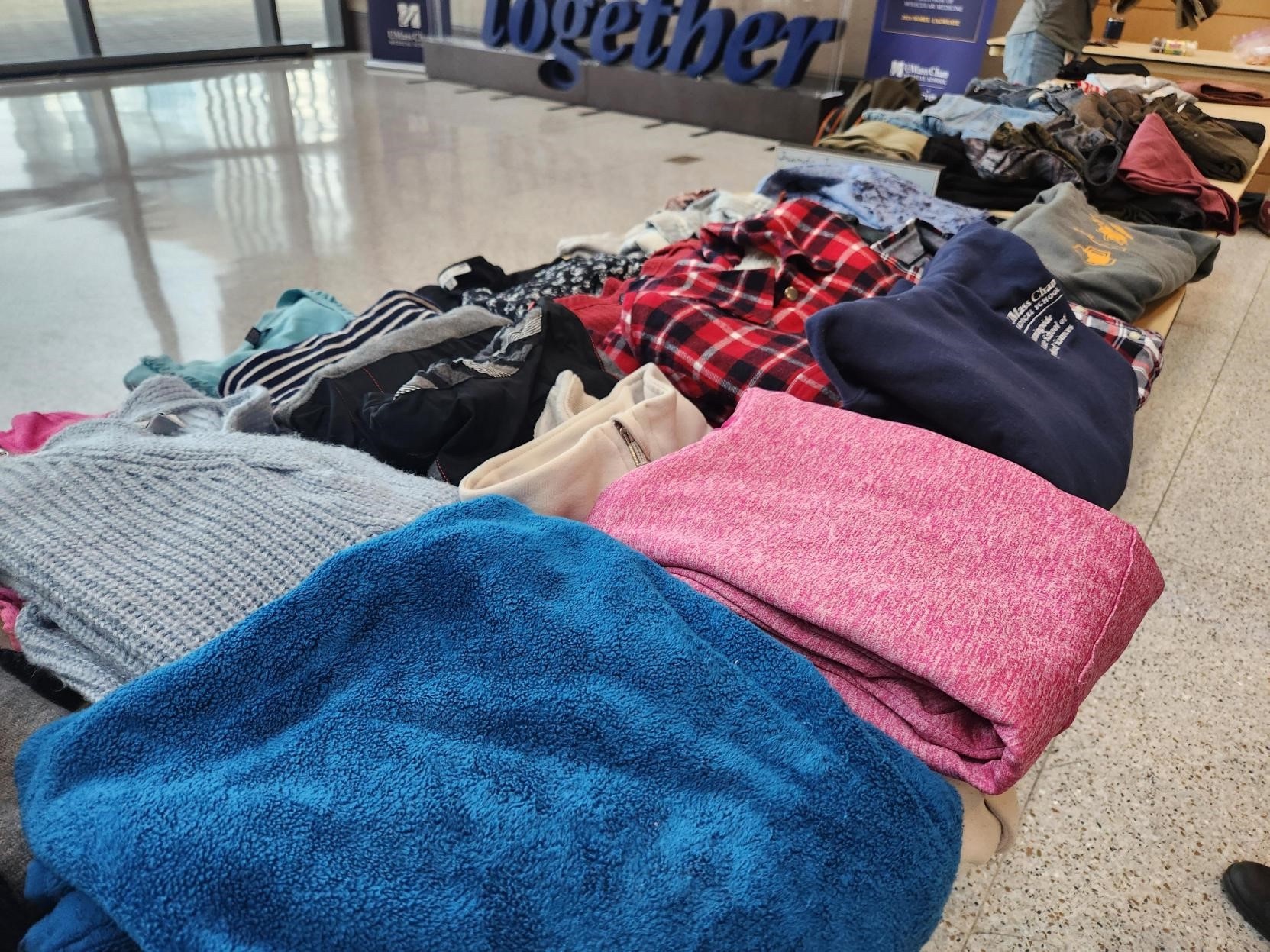 clothes exchange event in school lobby
