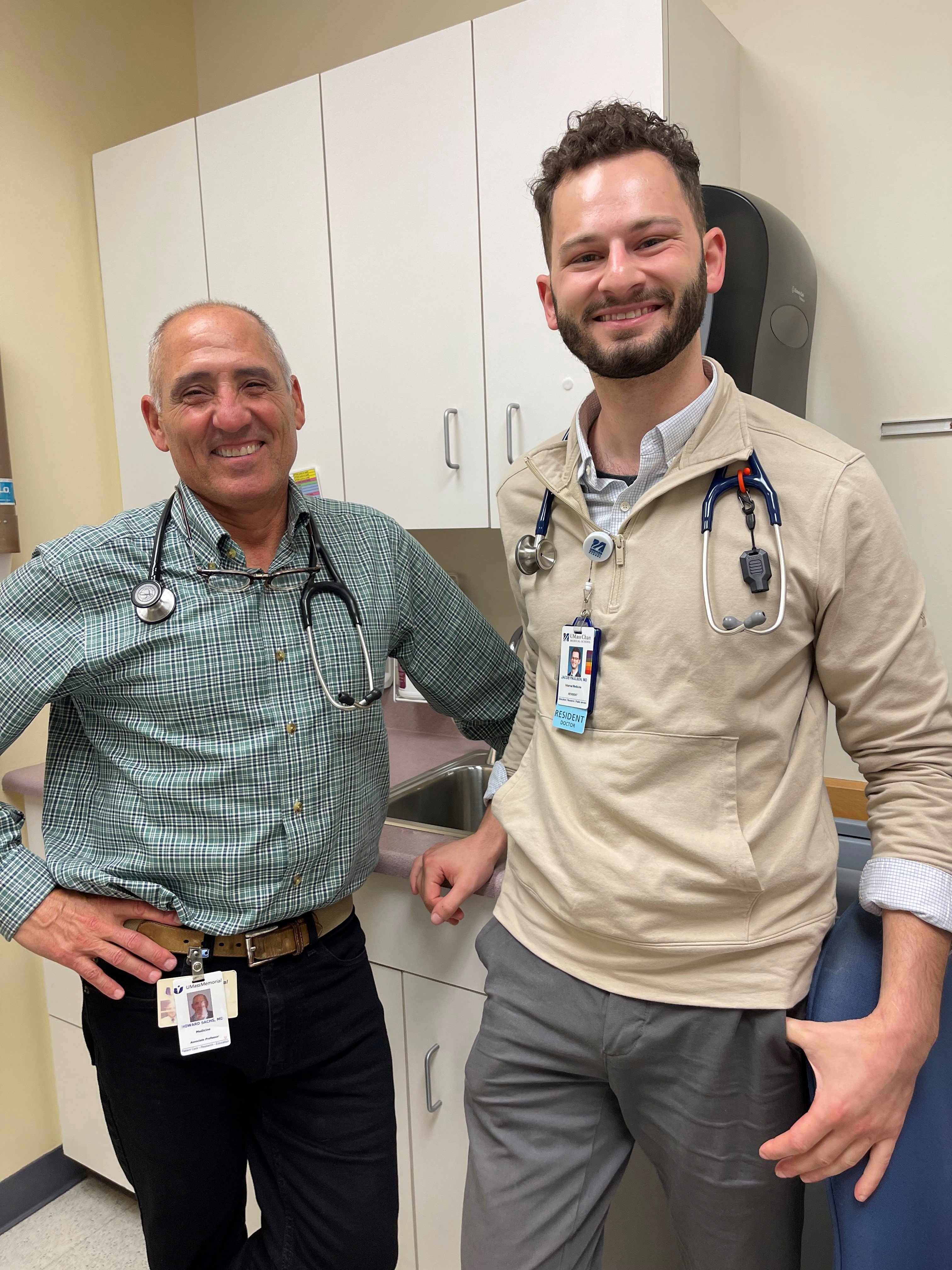 primary care student poses with faculty member