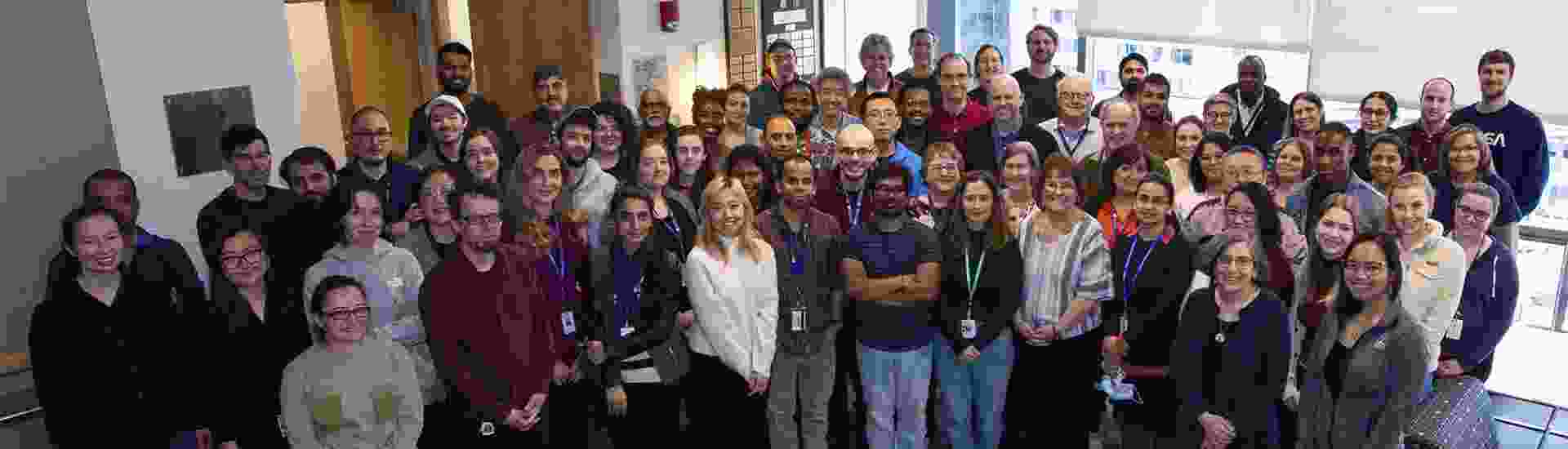 a large group of people posing for a photo of the department