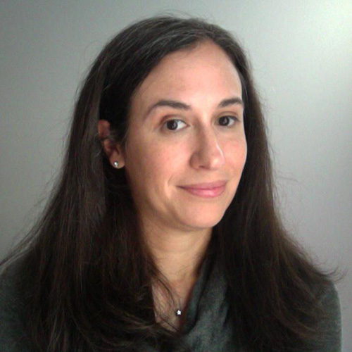 Lauren M. Weinstock, smiling woman with dark hair