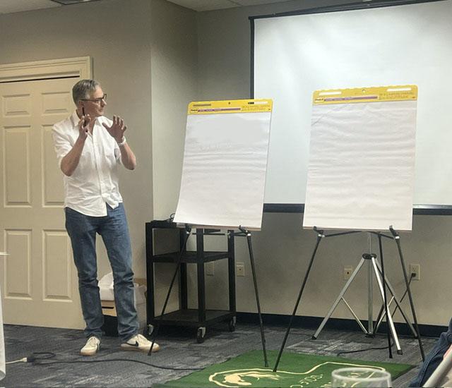 DSB Faculty member giving a chalk talk