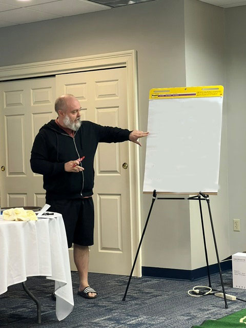 DSB Faculty member giving a chalk talk