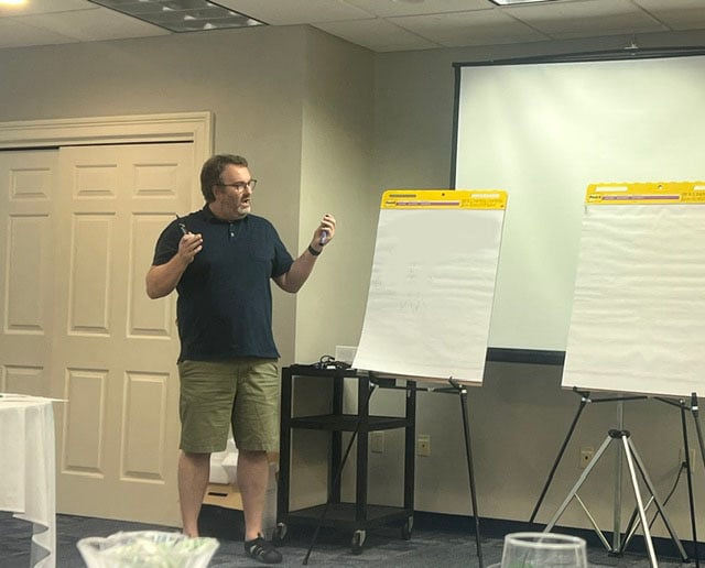 DSB Faculty member giving a chalk talk