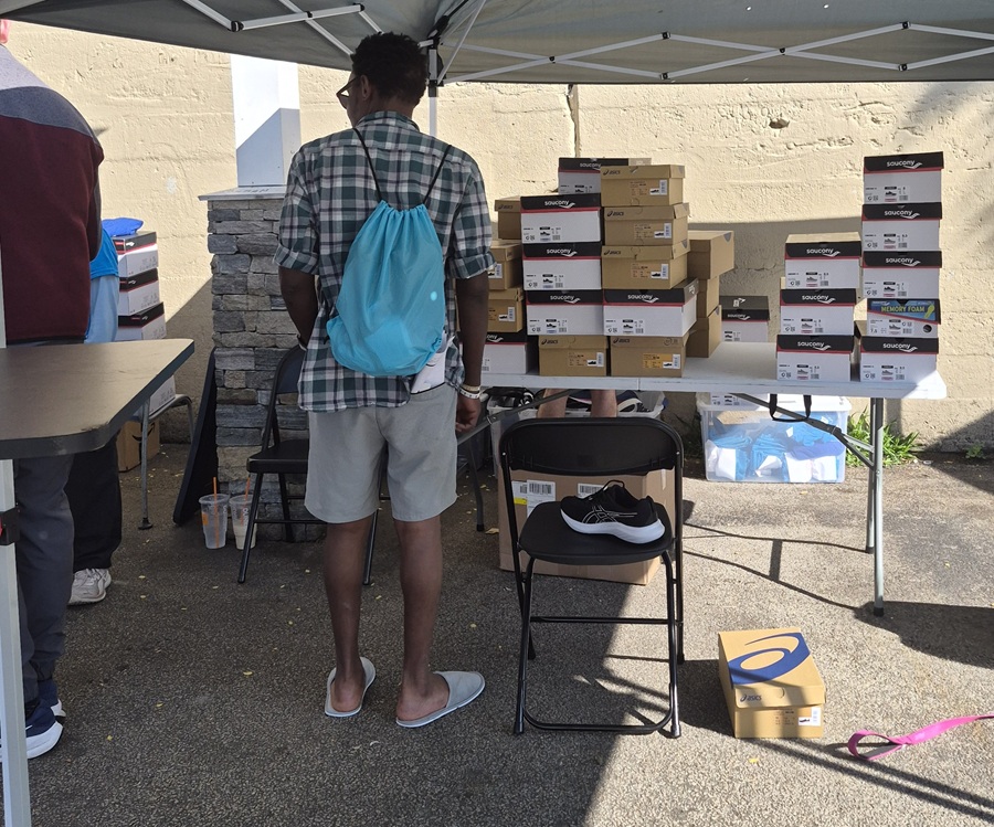 participant chosing a free pair of sneakers 