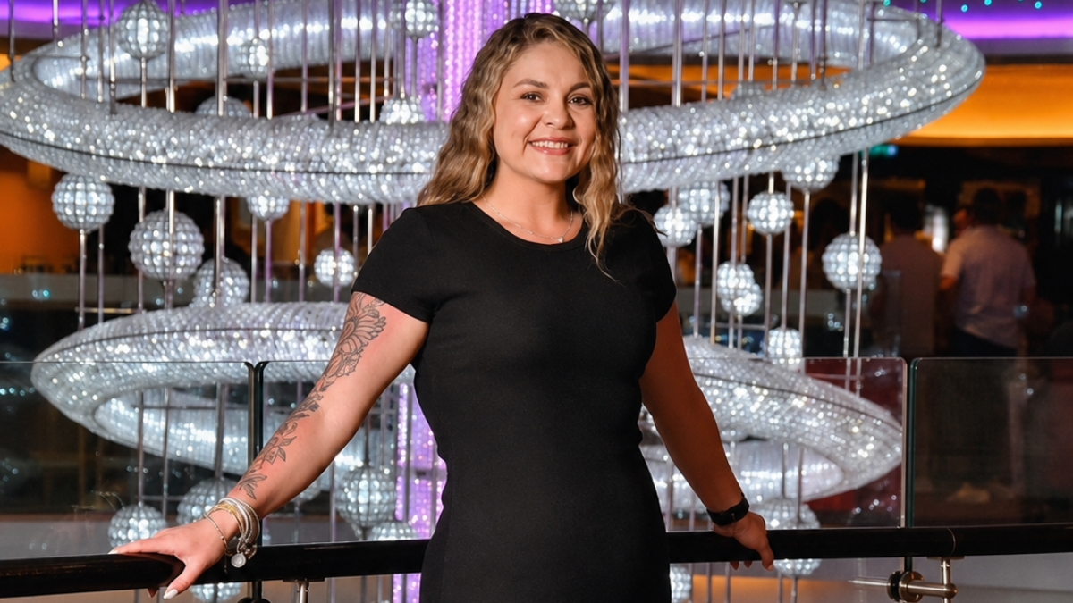 Azlynm standing in a cruise ship atrium