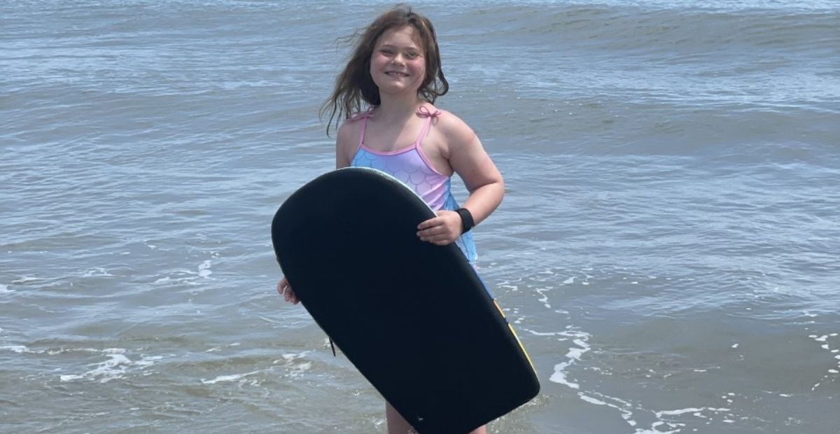 Jenna holding a Boogie Board