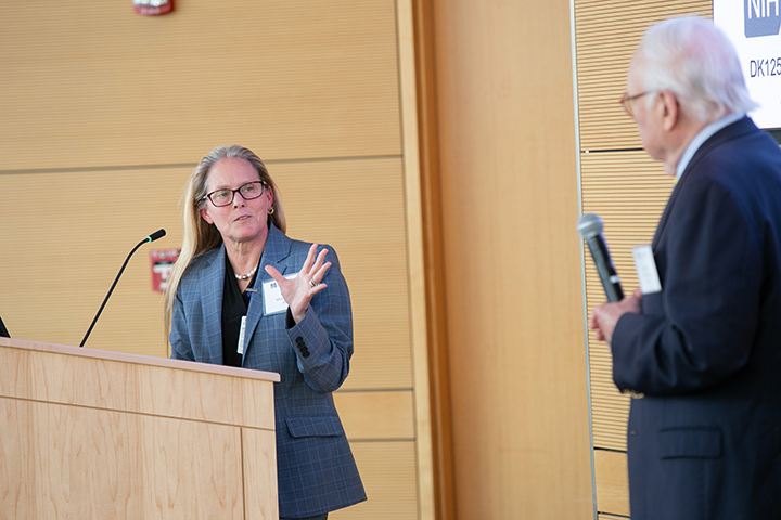 Beth McCormick and Thoru Pederson interact during a question-and-answer session.