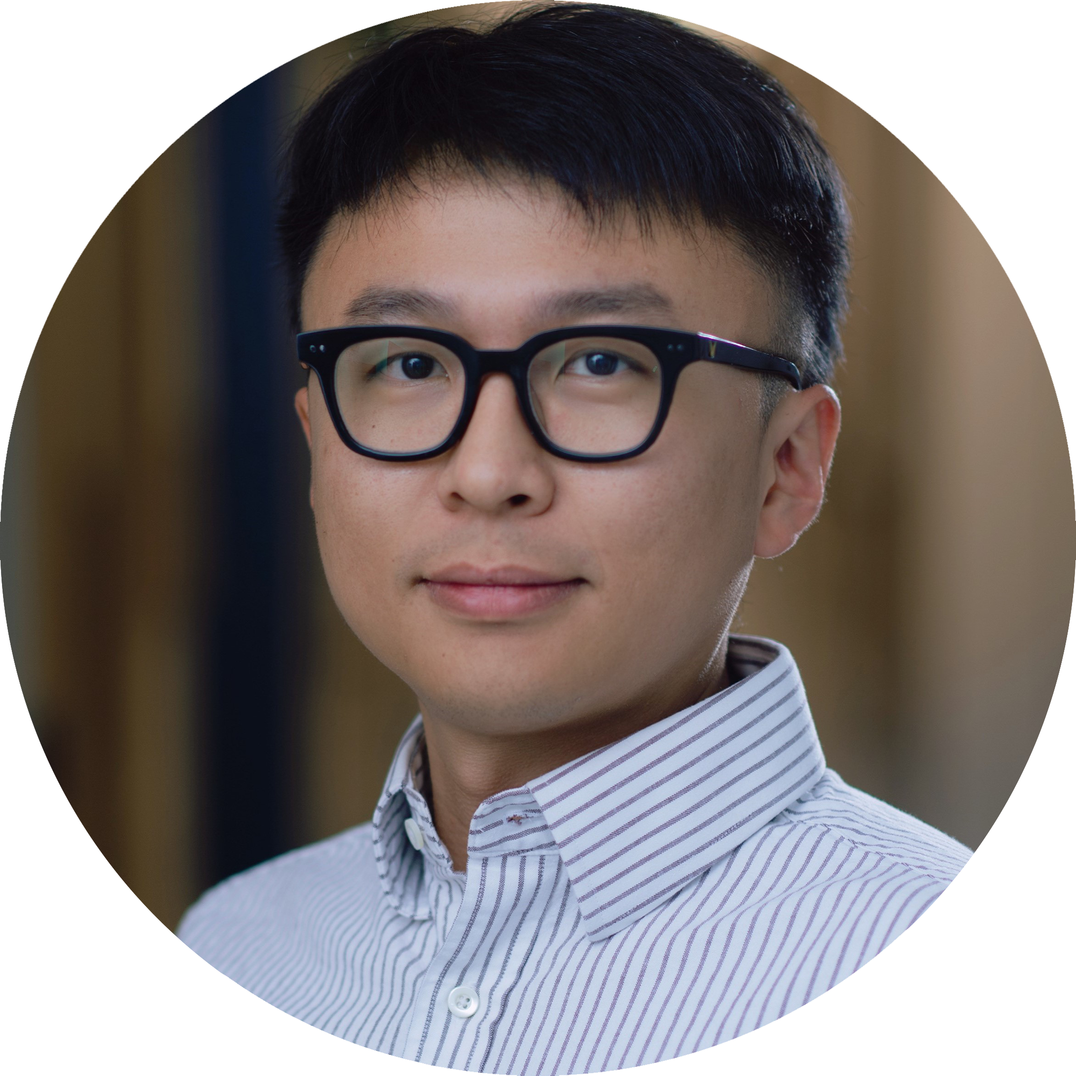 A headshot of Yu Qing, wearing glasses and wearing a light striped shirt, looking at the camera with a neutral expression.