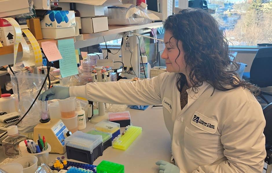 Graduate student working in the lab