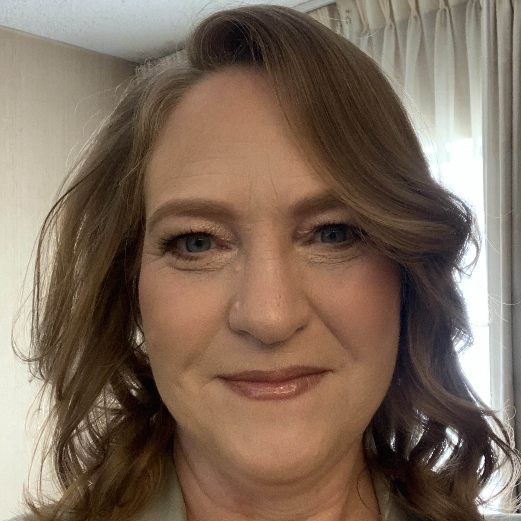 white middle aged woman with brown hair