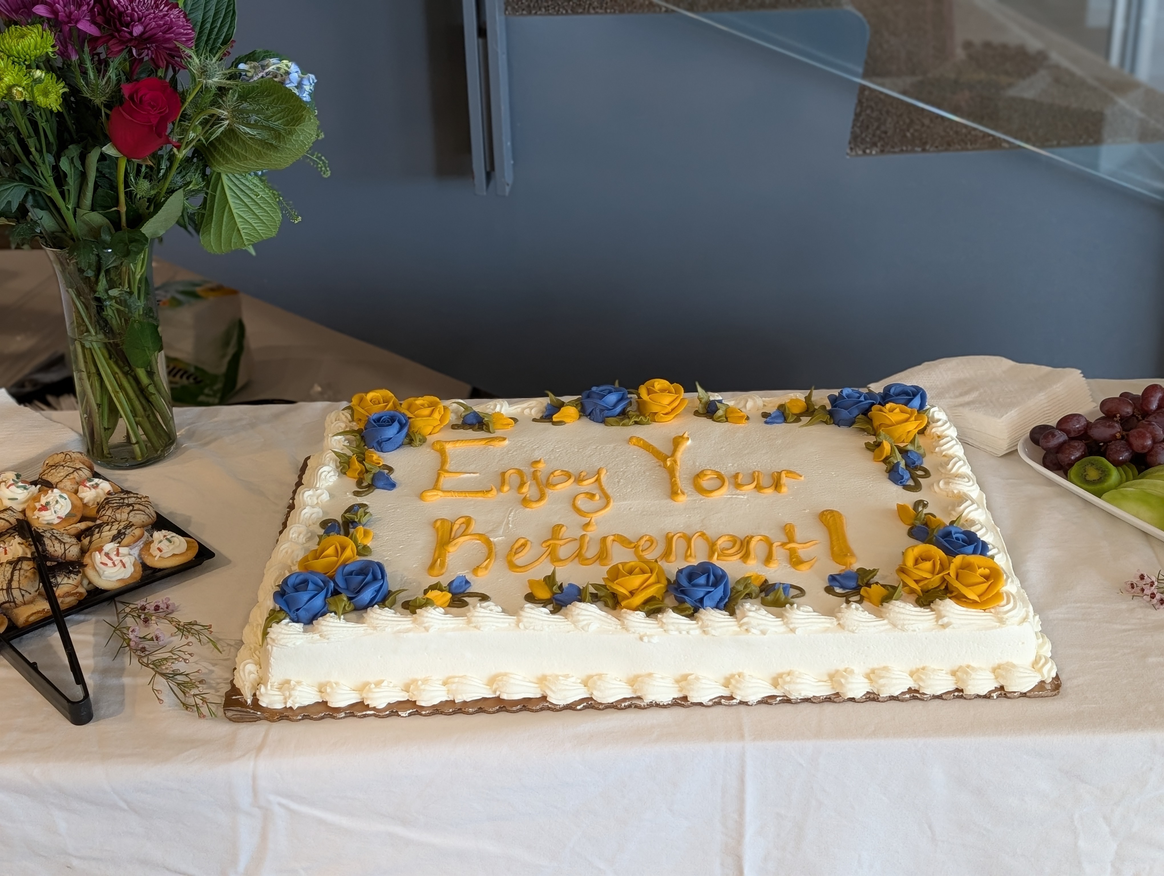 Cake with the message “Enjoy your retirement” written on top.