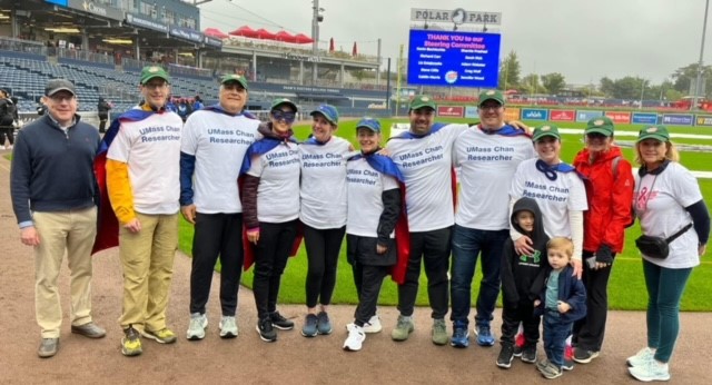 Group photo of the UMass Chan Cancer Research Team taken in 2023 at Polar Park.
