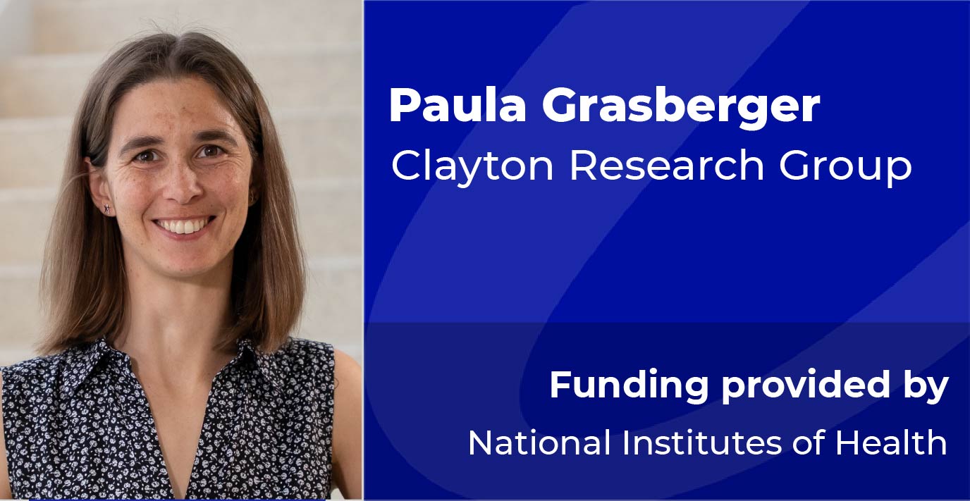 Researcher standing indoors. Text reads: “Paula Grasberger, Clayton Research Group. Funding provided by National Institutes of Health.”