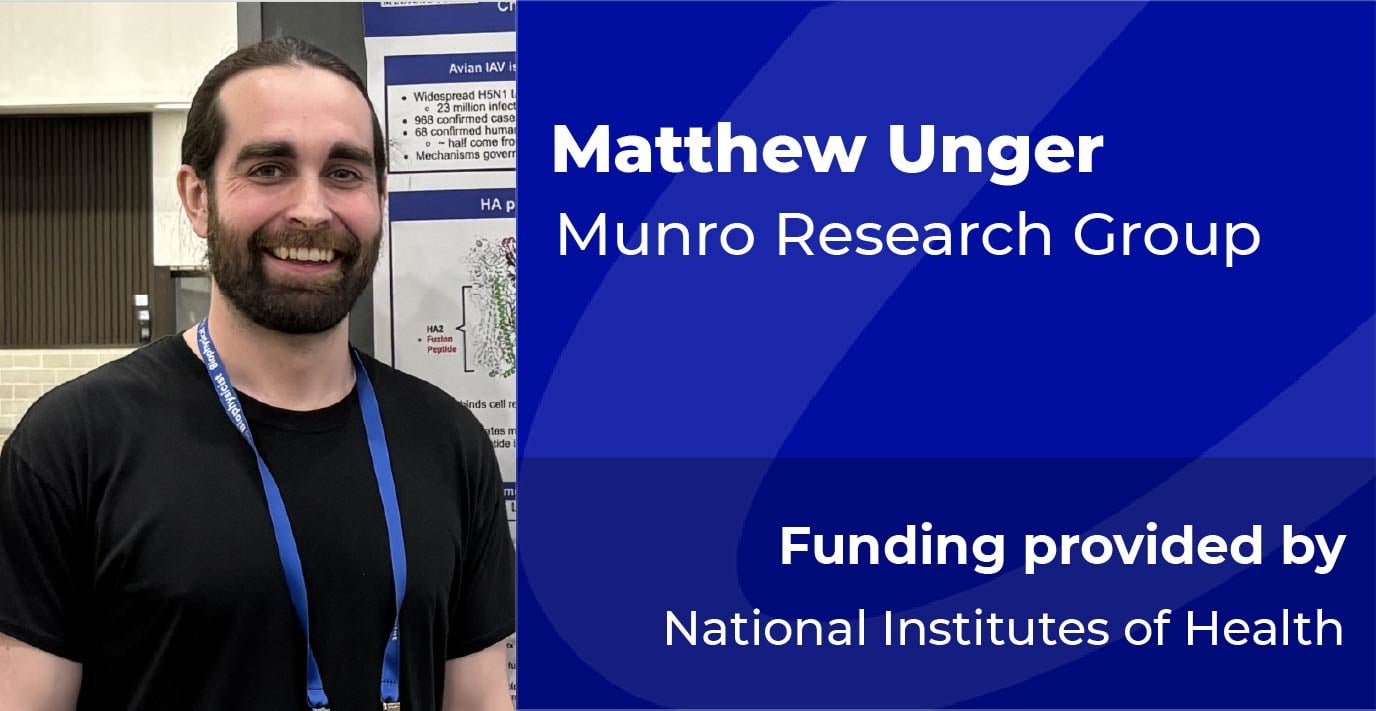A researcher stands in front of a scientific poster beside a blue information panel displaying the text: “Matthew Unger, Munro Research Group. Funding provided by National Institutes of Health.”