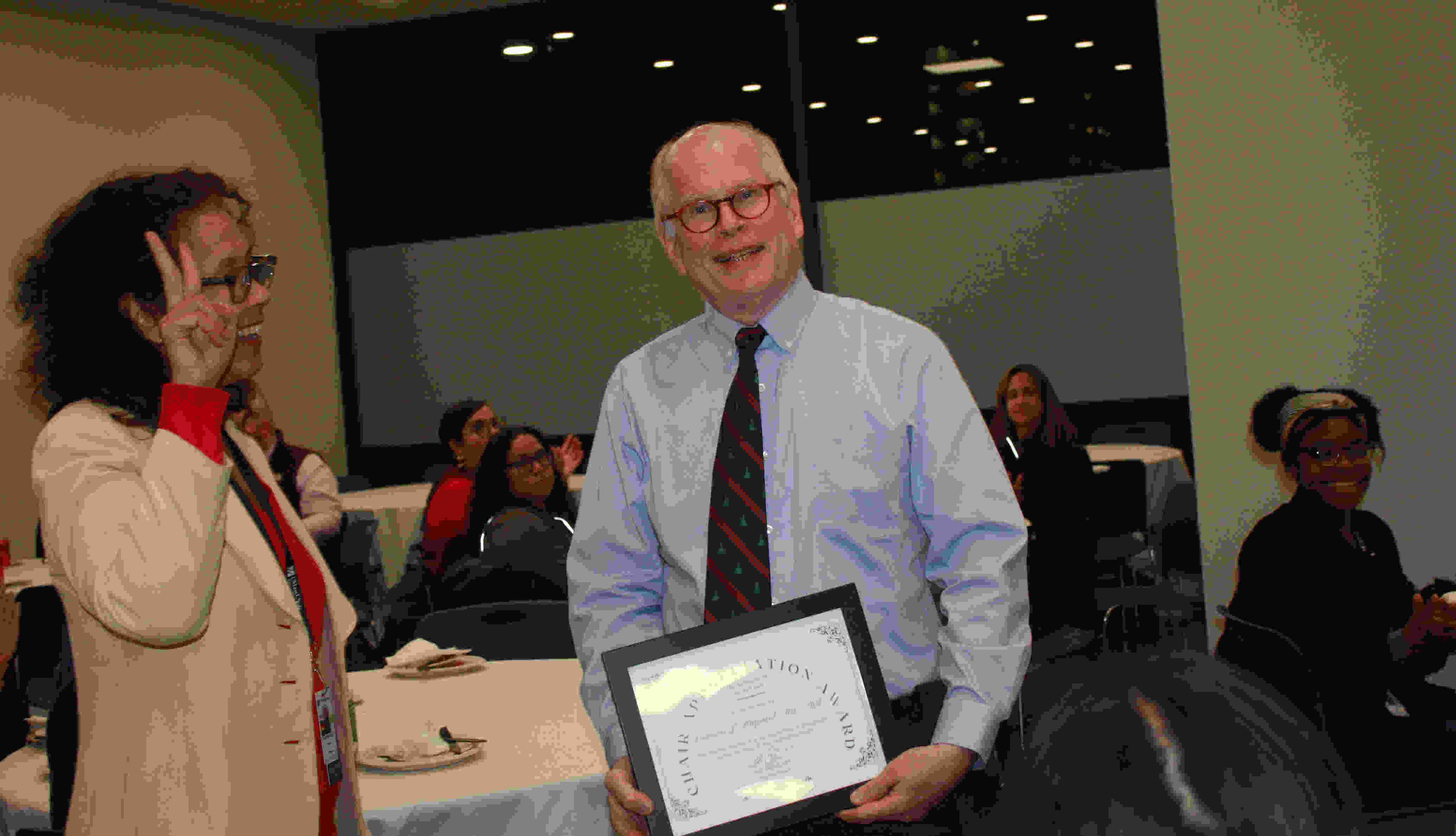 Dr. Barrett presenting Lawrence Hayward with 2023 Chair Award