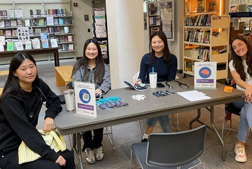 Worcester library members sitting at a table