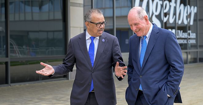 Photo of Tedros Adhanom Ghebreyesus and Chancellor Collins walking together