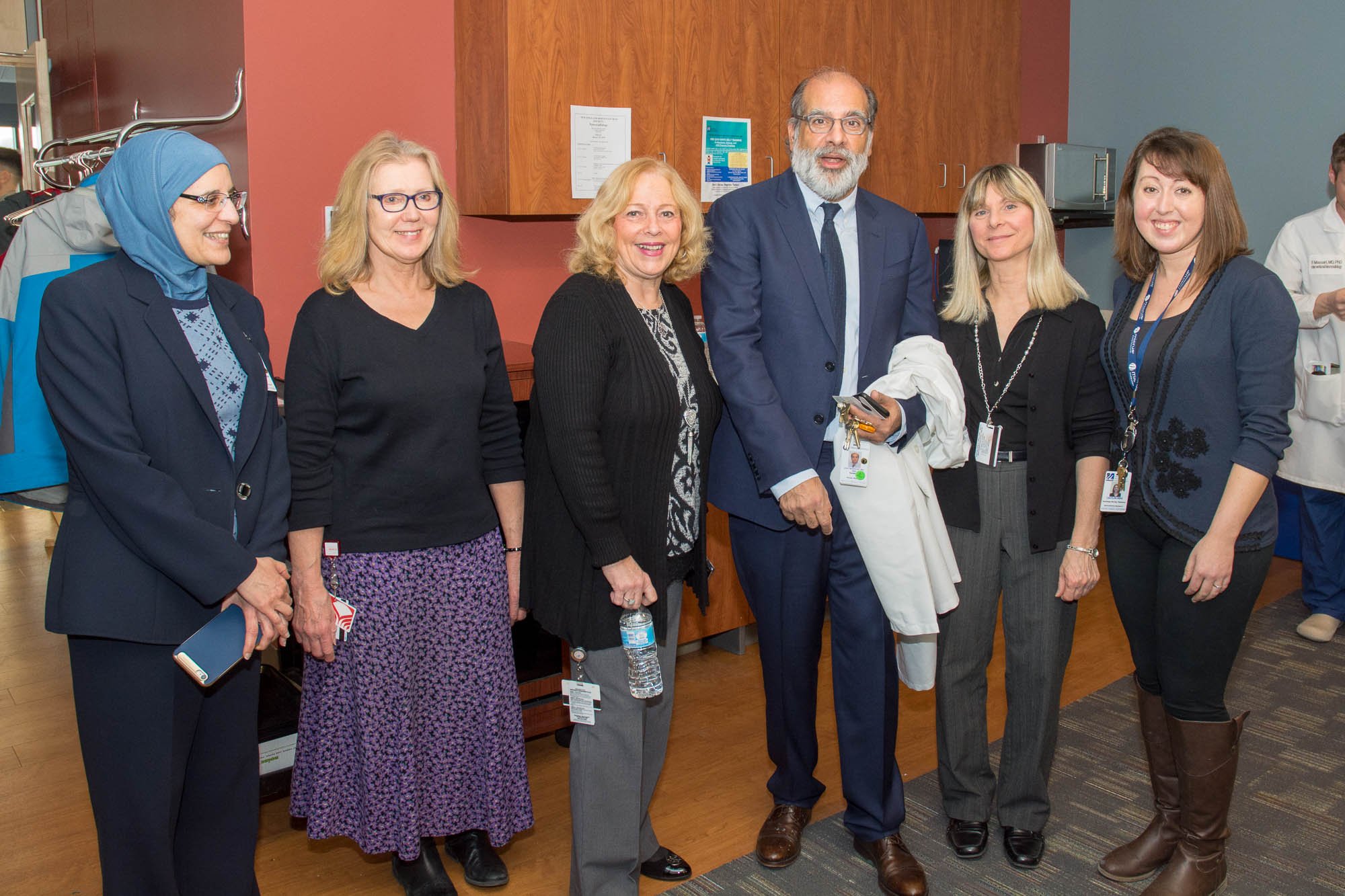 Ajay Wahkloo, MD with staff at retirement party