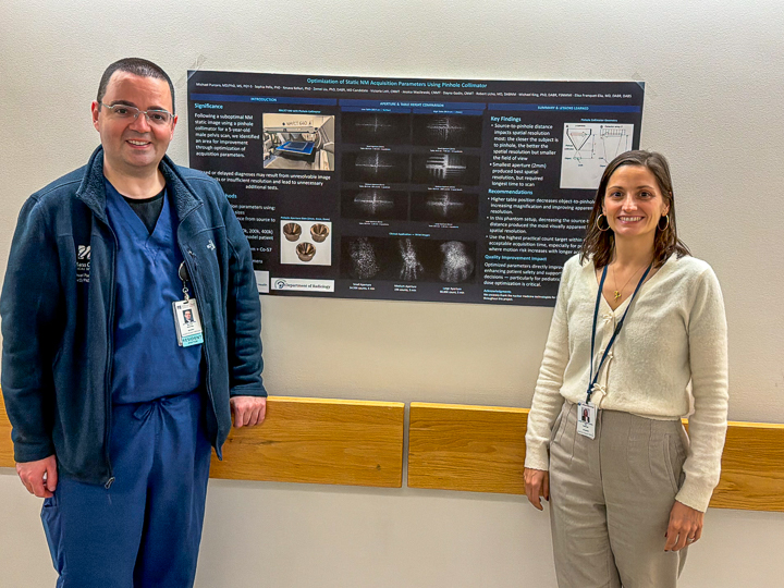 Michael Purcaro and Elisa Franquet Elia with poster