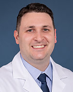 John C. Madore, MD