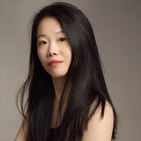 Asian young adult with long black hair