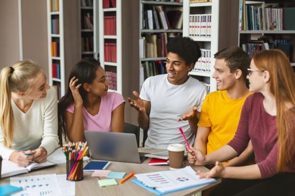 group of diverse students studying in a group