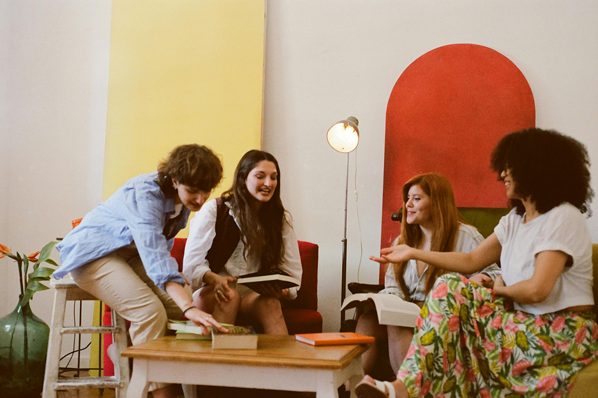 group of people indoors in a cozy gathering