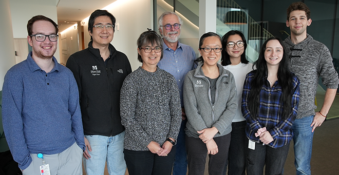 Research team standing together in a group