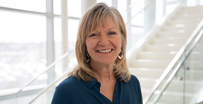 Maryann Davis wearing a blue shirt