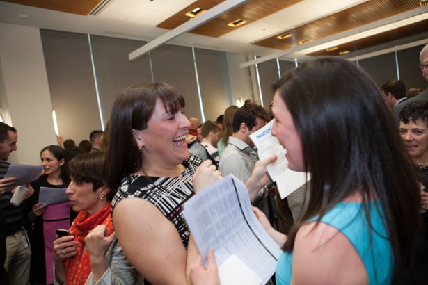 Anne Antonellis (left) and Claire Welteroth joyfully congratulate each other. Antonellis is going to Maine Medical Center for ob/gyn and Welteroth will pursue family medicine at Brown Medical School/Memorial Hospital.