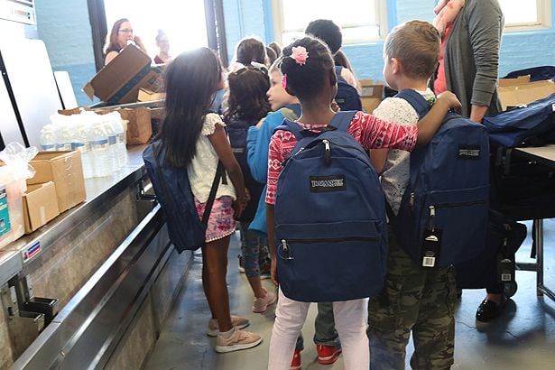 Students at Grafton Street Elementary School with their new packpacks