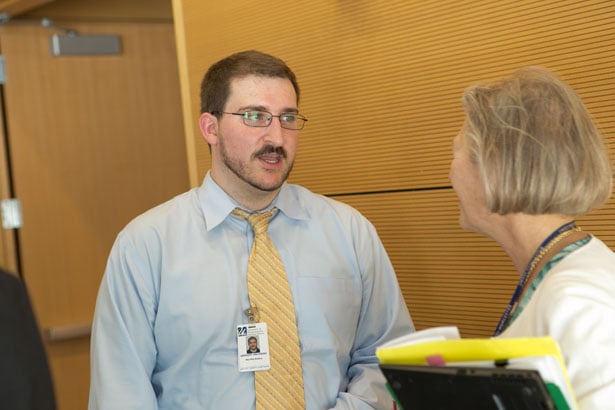 Senior Associate Dean for Educational Affairs Michele Pugnaire speaks with GSBS award recipient Greg Orlowski