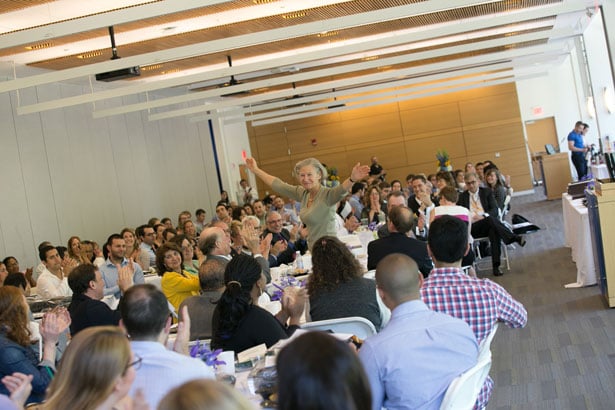 Michele P. Pugnaire, MD, who will step down from the role of senior associate dean for educational affairs in July, is recognized by the crowd.