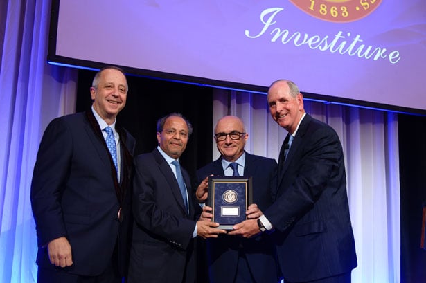 Douglas T. Golenbock, MD, is invested as the Pillar Chair in Biomedical Research by Sudhir Agrawal and Youssef El Zein of the Pillar Group and Chancellor Collins.