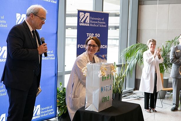 School of Medicine Dean Terence Flotte and Vice Provost/Associate Dean, Student Affairs Sonia Chimienti address the crowd.