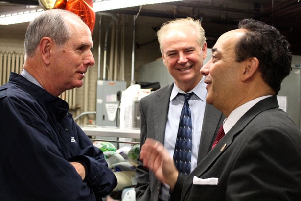 UMass Chan Medical School Chancellor Michael F. Collins talks with Veterans Inc. Executive Director Denis Leary and President Vincent J. Perrone Jr. 