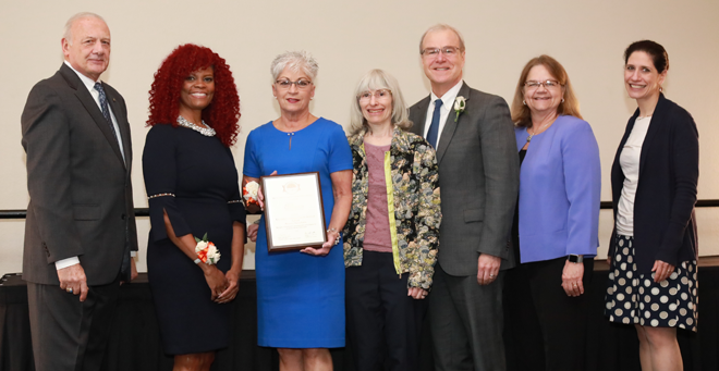 From left, ACGME President/CEO Thomas J. Nasca; ACGME Awards Program Liaison DeLonda Dowling; UMMS Graduate Medical Education Associate Dean Deborah M. DeMarco; UMMS GME Administrative Director Marilyn Leeds; UMMS School of Medicine Dean Terence R. Flotte; ACGME Board Director and Chair of the Awards Committee Diane Hartmann; and The Arnold P. Gold Foundation COO Elizabeth Cleek