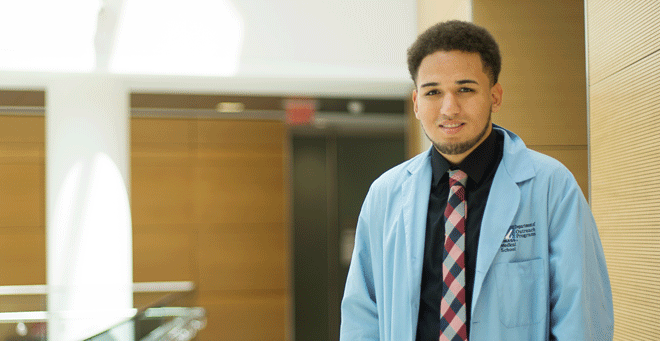 North High School senior and aspiring nurse practitioner Enrique Delgado is a member of the High School Health Careers Program Class of 2016.