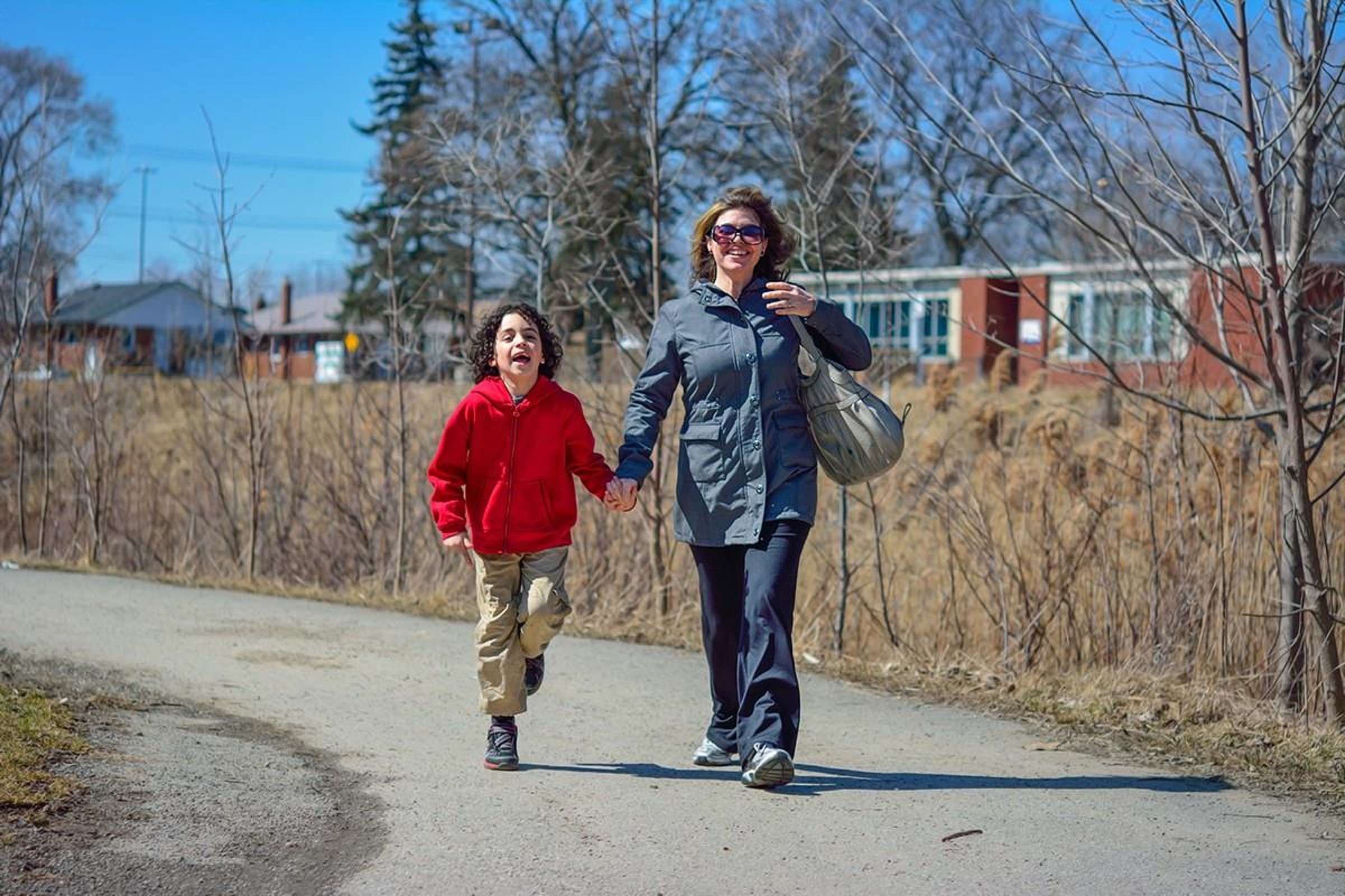 Parent and child walking